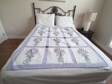 Soft color handmade patchwork quilt