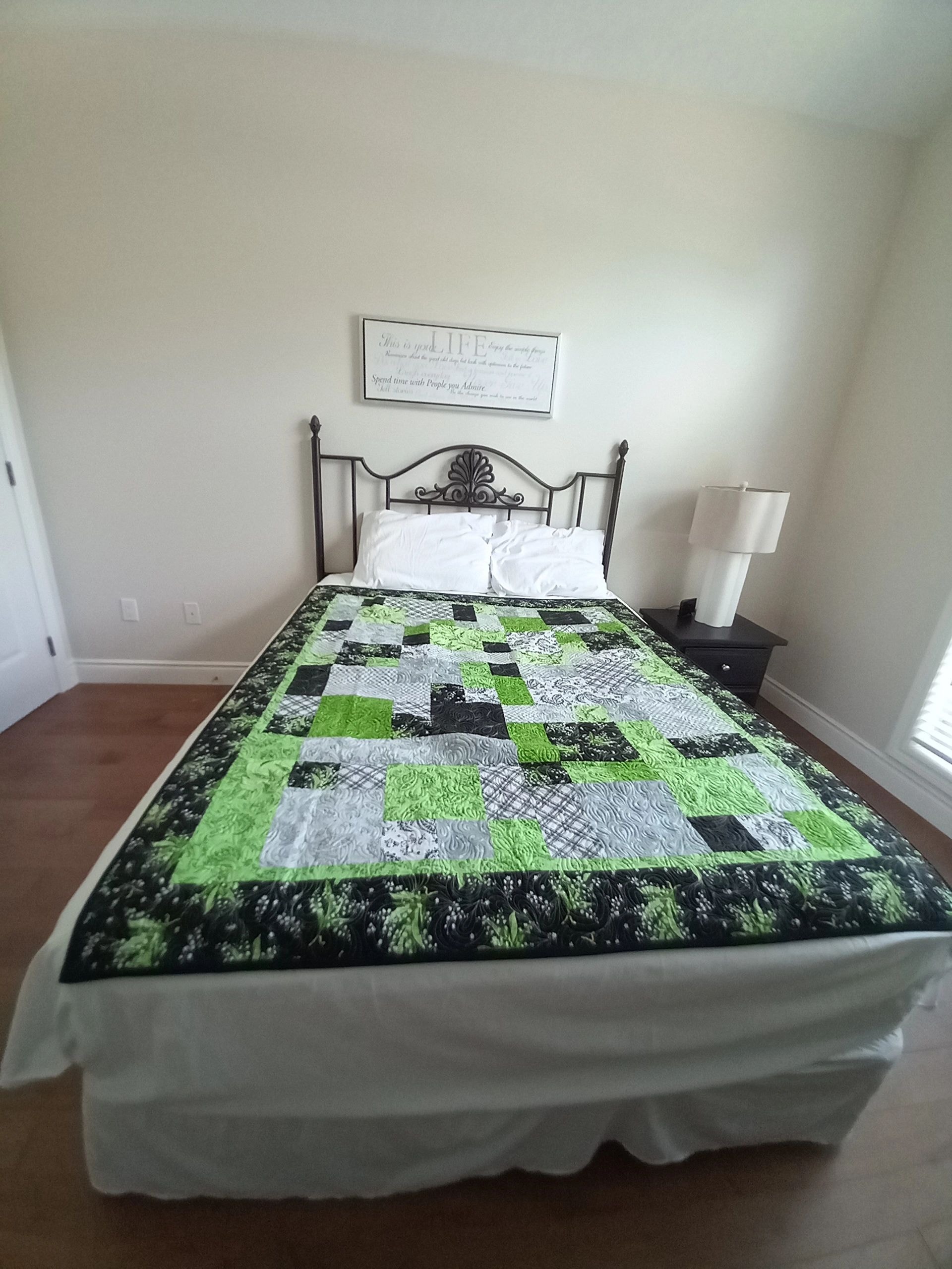 Soft green geometric modern handmade quilt